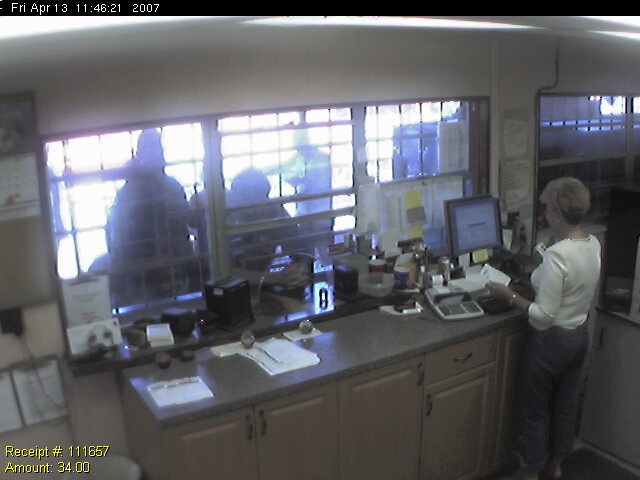 Cashier Station cashier paying cash to peddlers